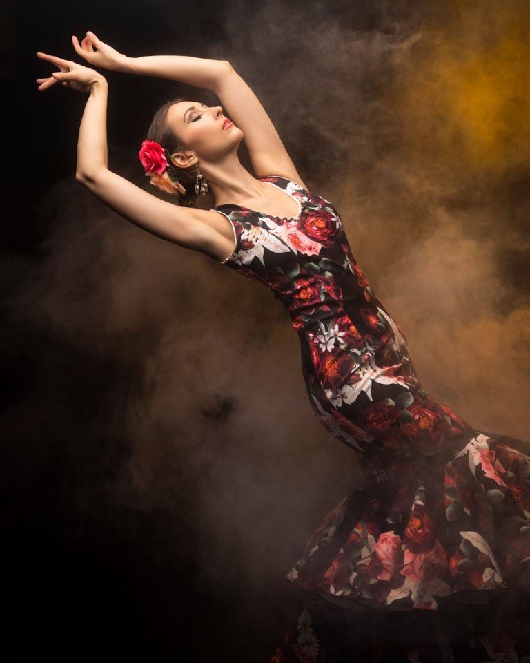 woman in black red and white floral dress